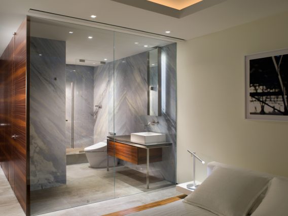 Continuum Miami residence marble and glass bathroom