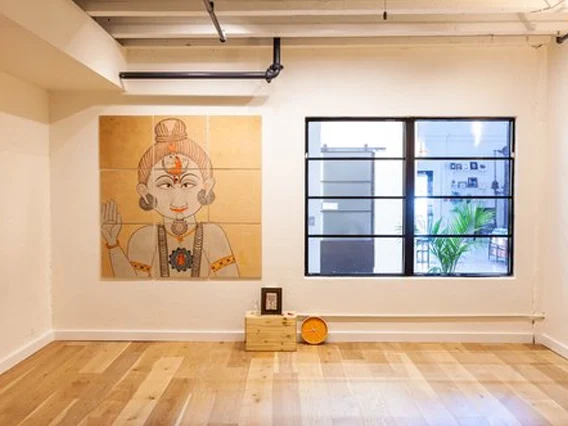 PtrBlt Miami Yoga Garage renovation photo of a studio corner and window