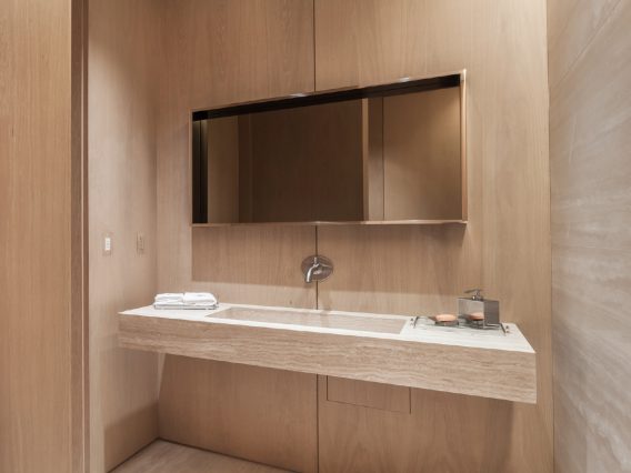 Continuum North Miami private residence bathroom vanity, all in light marble
