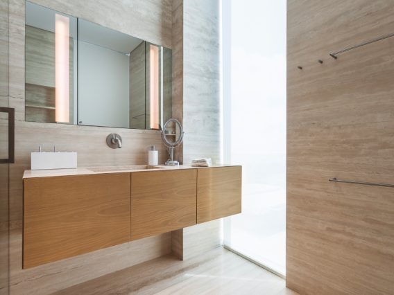 Continuum Miami Private PH Residence wood vanity and marble bathroom