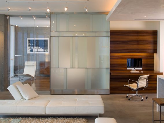 Continuum Miami residence bedroom with glass wall